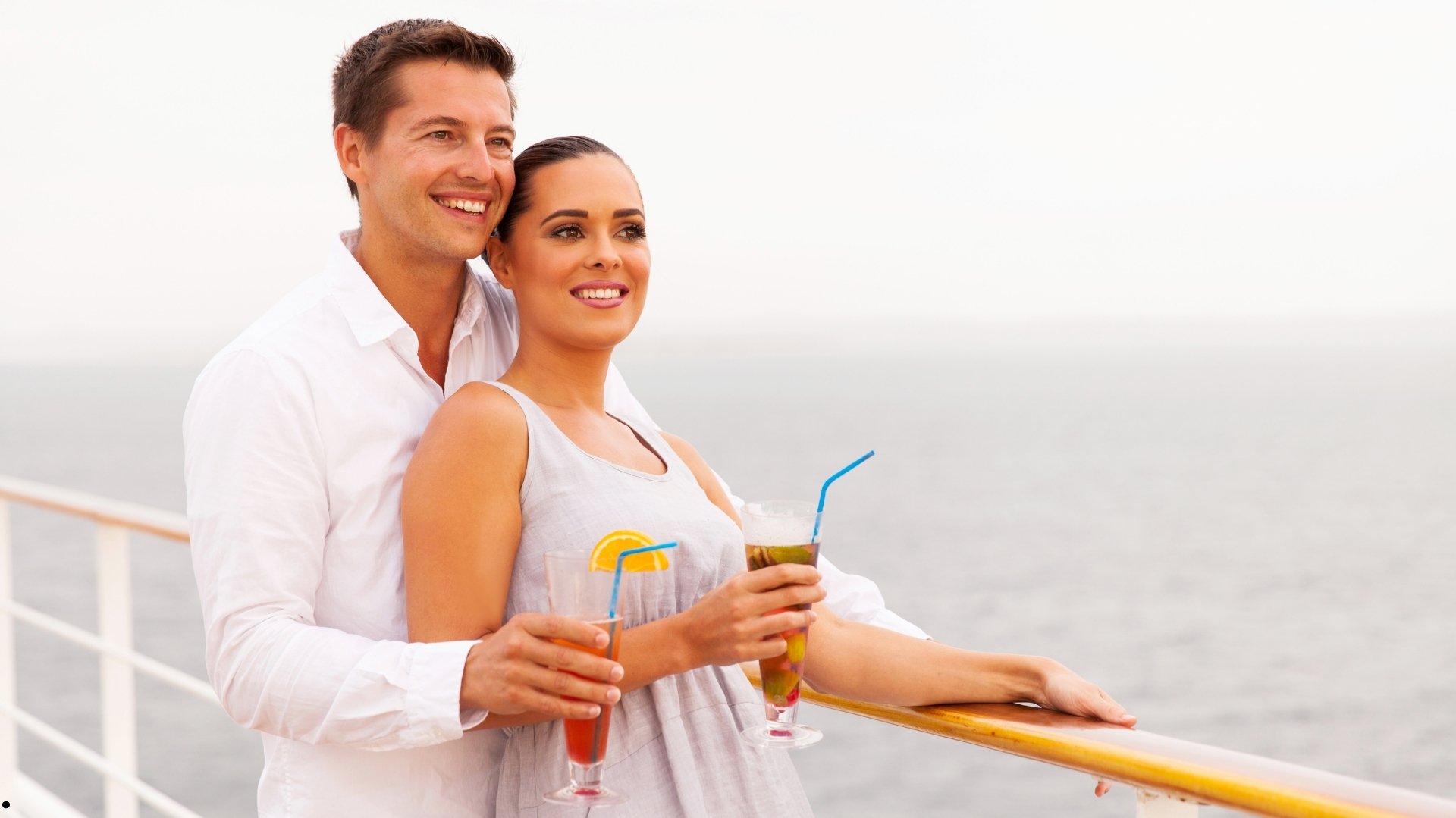 Couple enjoying a worldwide cruise holiday arranged by KAPICO Travels Kuwait