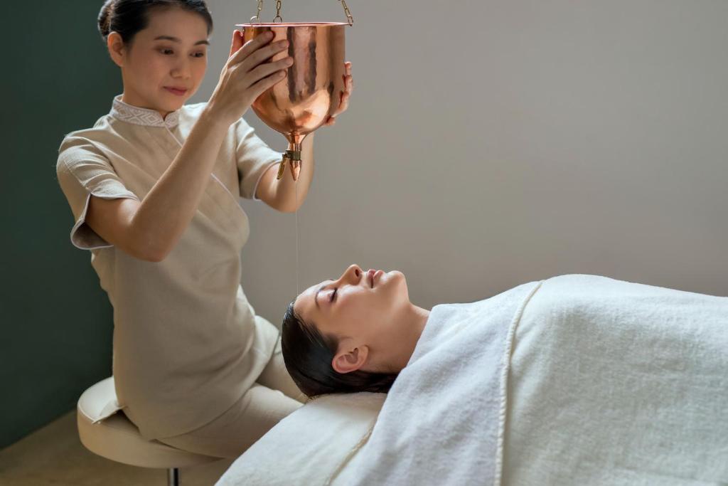 Traditional wellness therapy at Zulal Wellness Resort by Chiva-Som